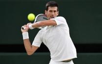 Tennis - Wimbledon - All England Lawn Tennis and Croquet Club, London, Britain - July 13, 2018 Serbia's Novak Djokovic in action during his semi final match against Spain's Rafael Nadal. REUTERS/Toby Melville