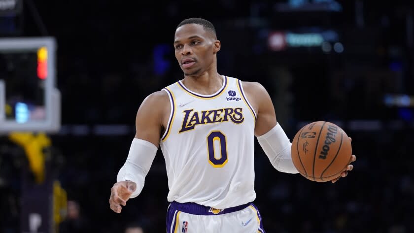 Los Angeles Lakers guard Russell Westbrook dribbles during the first half.