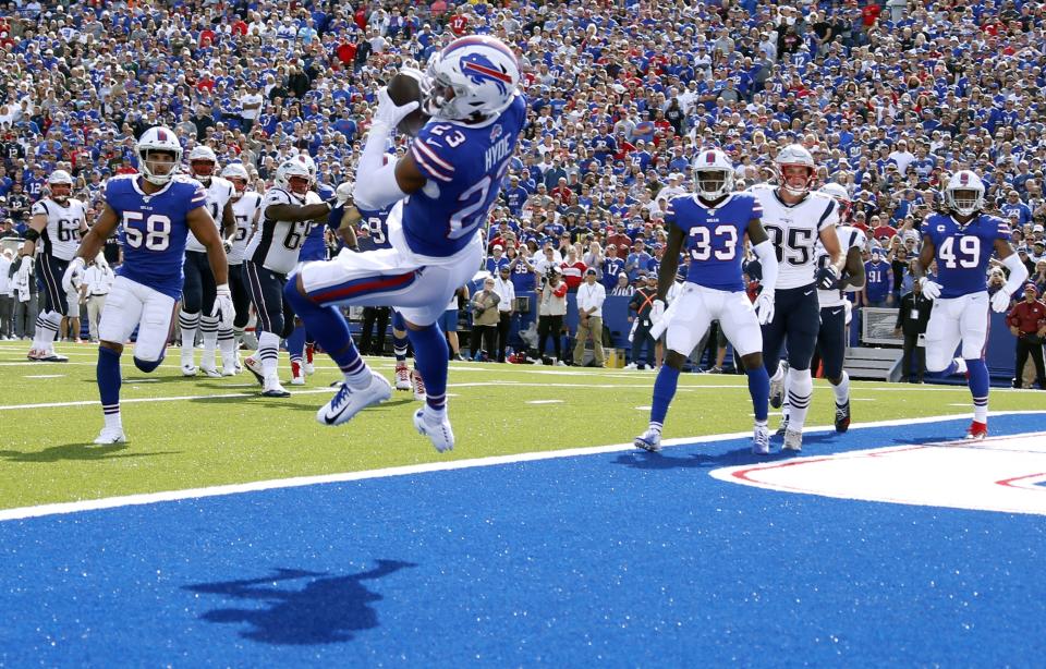 Buffalo Bills safety Micah Hyde intercepts a pass in the end zone, thrown by New England Patriots quarterback Tom Brady, in the first half of an NFL football game, Sunday, Sept. 29, 2019, in Orchard Park, N.Y. (AP Photo/Ron Schwane)