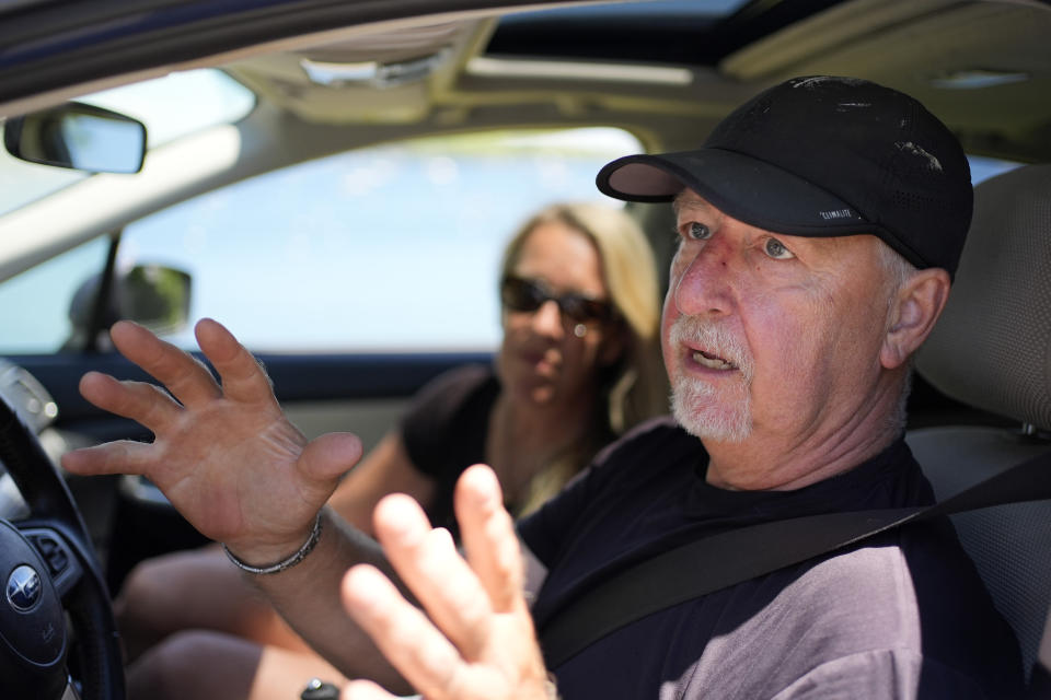 Paul Hodgson talks about the anger in the community over one homeowner's poisoning of a neighbor's trees to gain a waterfront view, Tuesday, June 4, 2024, in Camden, Maine. (AP Photo/Robert F. Bukaty)