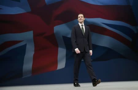 Britain's Chancellor of the Exchequer George Osborne arrives to deliver his keynote speech at the annual Conservative Party Conference in Manchester, Britain October 5, 2015. REUTERS/Suzanne Plunkett