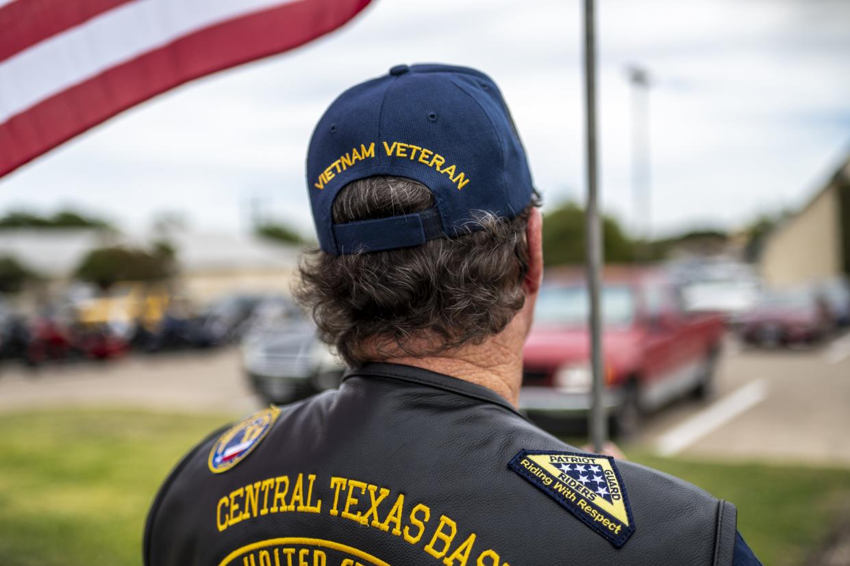 Calvin Story, a Vietnam veteran who served in the U.S. Navy, stands with other members of Patriot Guard Riders outside Dossman Funeral Home on Saturday Oct. 21, 2023 in Belton. Sgt. Turner Yearwood Johnston's remains were returned and buried in Belton after 80 years.