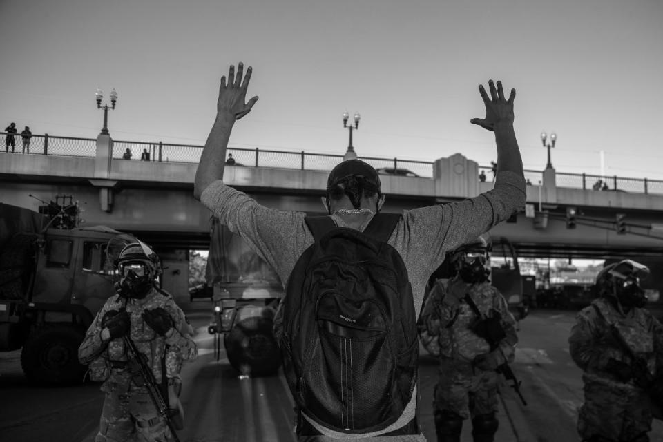 A protester confronts members of the Minnesota National Guard after the murder of George Floyd.<span class="copyright">Victor J. Blue</span>