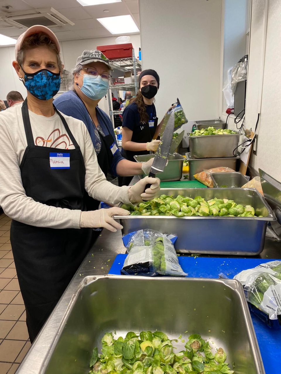 Volunteers cooked and served a traditional Thanksgiving meal to people in need at the Community Kitchen on Thursday, Nov. 25.