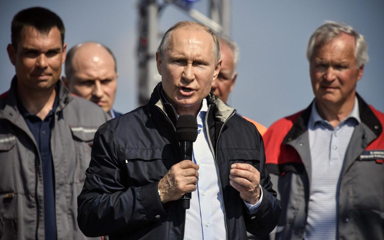 Russian President Vladimir Putin speaking at the opening of the Crimean Bridge over the Kerch Strait - AFP