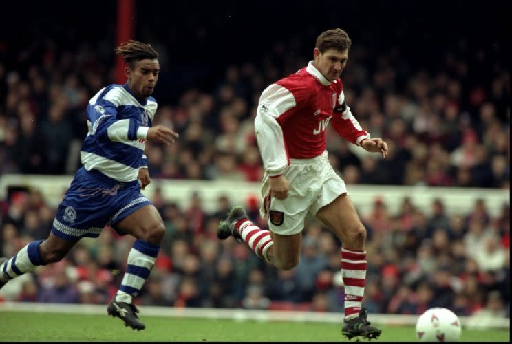 26 Dec 1995: Trevor Sinclair of Queens Park Rangers chases Tony Adams of Arsenal during the FA Carling Premiership match played at Highbury in London, England. Arsenal won the match 3-0. Mandatory Credit: Shaun Botterill/Allsport