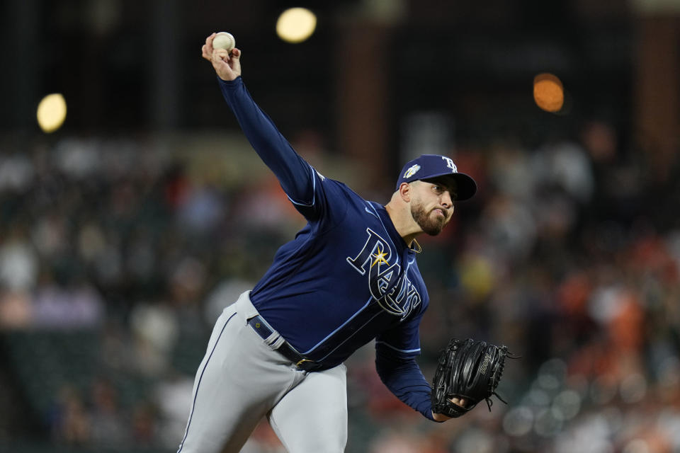 Tampa Bay Rays starting pitcher Aaron Civale throws to the Baltimore Orioles in the first inning of a baseball game, Thursday, Sept. 14, 2023, in Baltimore. (AP Photo/Julio Cortez)