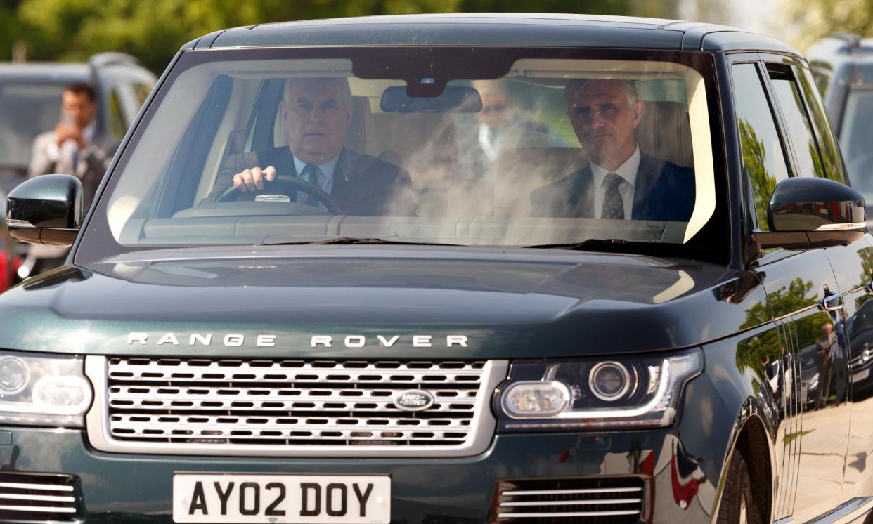 <span>Prince Andrew drives his Range Rover car in Windsor Great Park.</span><span>Photograph: Max Mumby/Indigo/Getty Images</span>
