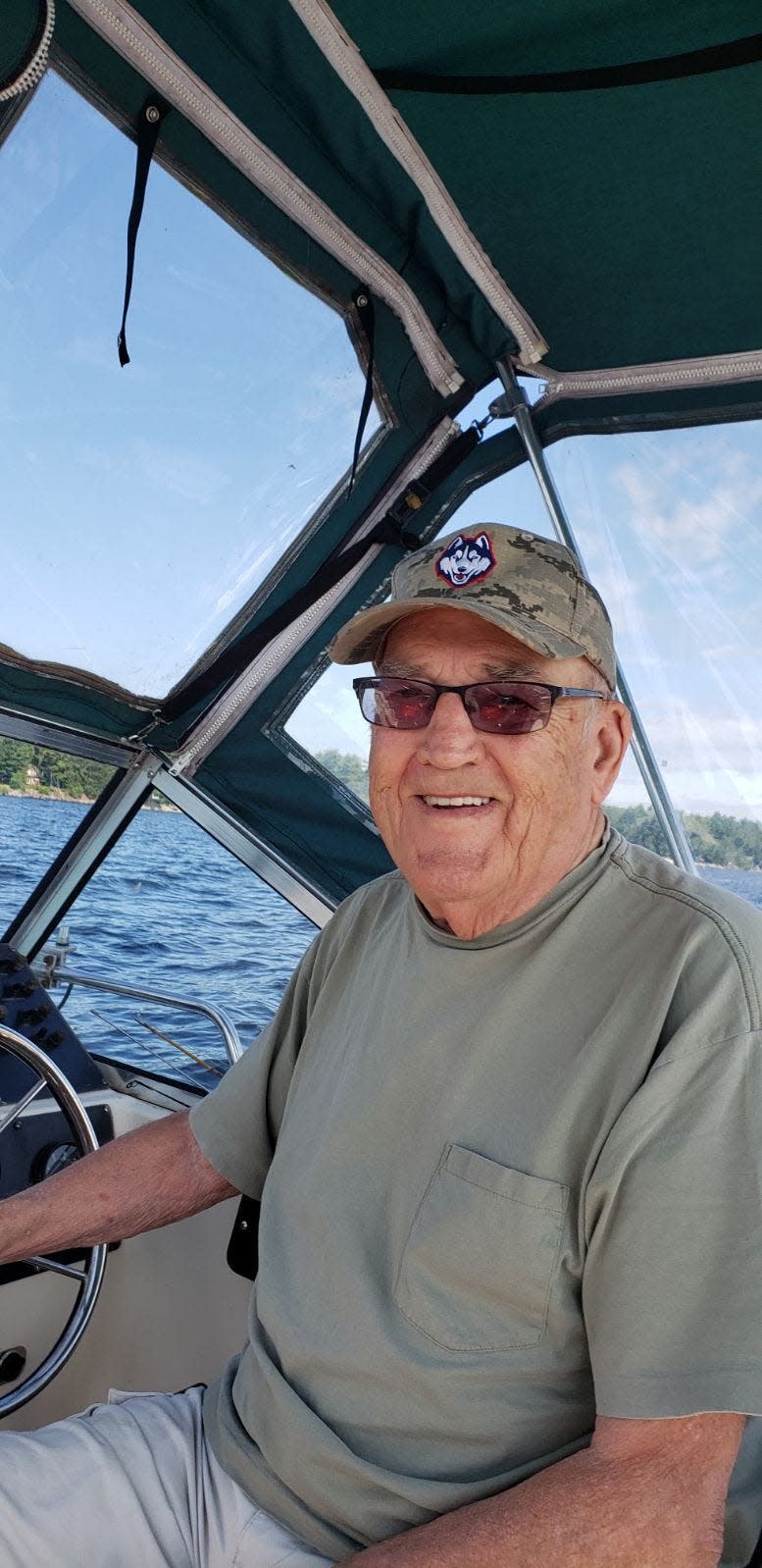 Roger Bacon, shown enjoying one of his favorite pastimes, fishing on Sebago Lake in Maine.