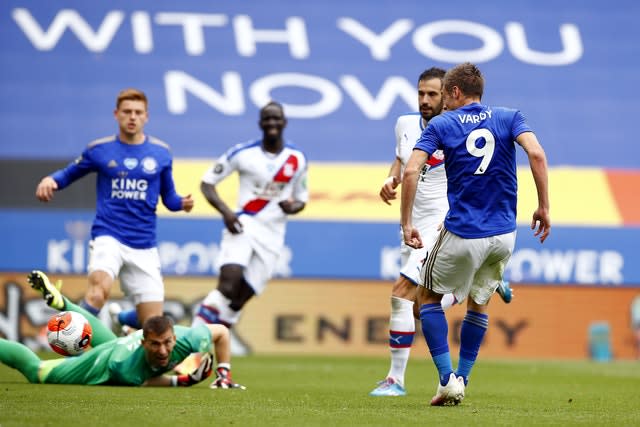 Leicester striker Jamie Vardy slots home his 100th Premier League goal. The division's leading scorer, who made his top-flight debut at the age of 27, became only the 29th man to achieve the feat with the first of his two goals against Crystal Palace