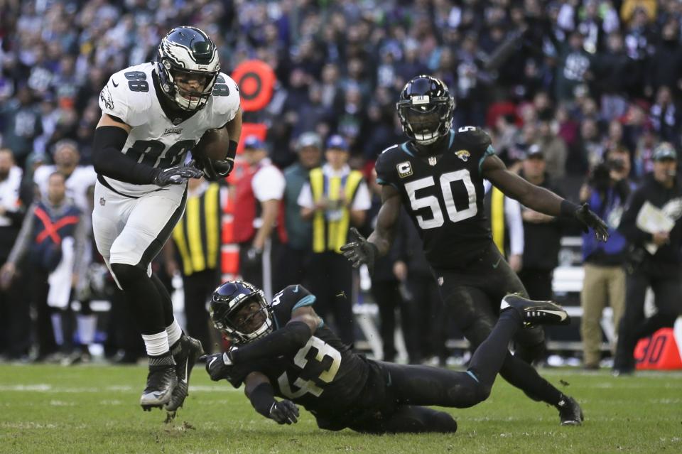 Philadelphia Eagles tight end Dallas Goedert (88) heads to score a touchdown during the first half of an NFL football game against Jacksonville Jaguars at Wembley stadium in London, Sunday, Oct. 28, 2018. (AP Photo/Tim Ireland)