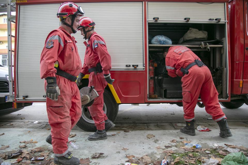 In this photo taken on Friday, Nov. 29, 2019, rescuers from Serbia operate at a collapsed building after the 6.4-magnitude earthquake in Durres, western Albania. In the initial hours after a deadly pre-dawn earthquake struck Albania, pancaking buildings and trapping dozens of sleeping people beneath the rubble, the country’s neighbors sprang into action. Offers of help flooded in from across Europe and beyond, with even traditional foes setting aside their differences in the face of the natural disaster. The 6.4-magnitude earthquake that struck Albania on Tuesday killed at least 49 people, injured 2,000 and left at least 4,000 homeless. (AP Photo/Visar Kryeziu)