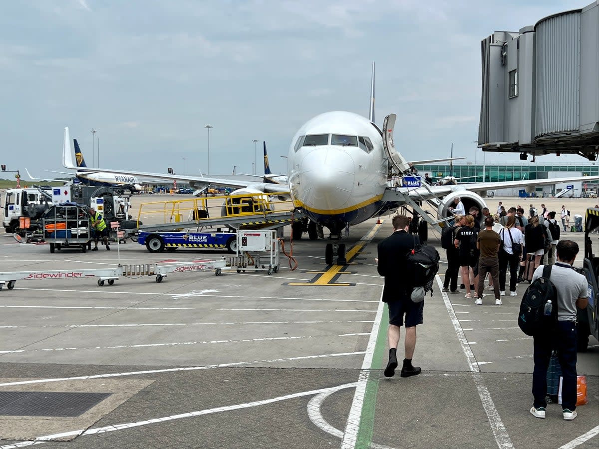 On the move: boarding a Ryanair plane at London Stansted while flights were being grounded at Gatwick and Heathrow (Simon Calder)