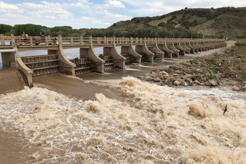 In this May 9, 2021, photo, a dam along the Rio Grande is seen near San Acacia, New Mexico. Forecasters with the National Weather Service are delivering good news for cities and farmers who depend on two major rivers in the southwestern U.S. The headwaters of the Rio Grande and the Pecos River recorded some of the best snowfall in years, resulting in spring runoff that will provide a major boost to reservoirs along the rivers.