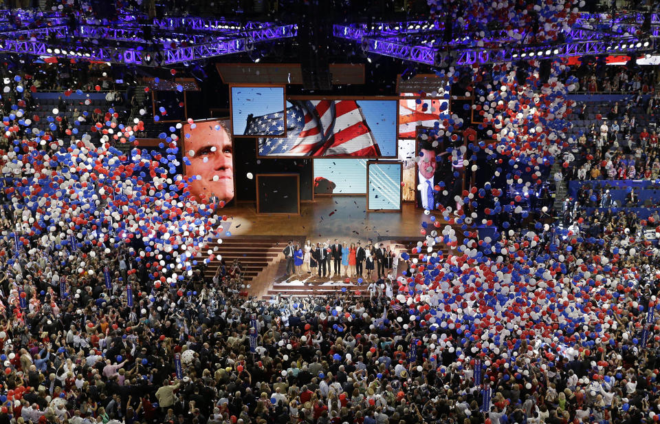 Republican presidential nominee Mitt Romney and vice presidential nominee Rep. Paul Ryan are join on the stage by their families at the end of the Republican National Convention in Tampa, Fla., on Thursday, Aug. 30, 2012. (AP Photo/Patrick Semansky)