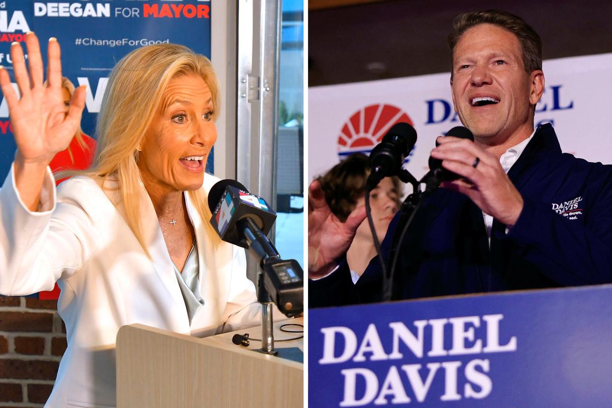 Mayoral candidates Donna Deegan, left, and Daniel Davis appear before their supporters following Tuesday's election in Jacksonville. The pair will advance to May's runoff election for Jacksonville Mayor.