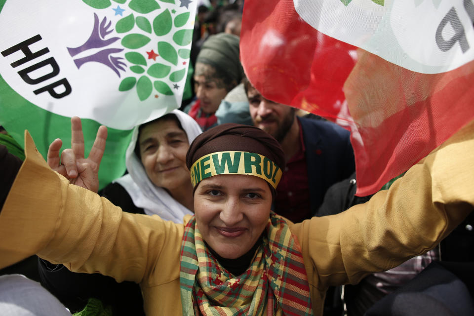 Supporters of pro-Kurdish Peoples' Democratic Party, or HDP, gather to celebrate the Kurdish New Year and to attend a campaign rally for local elections that will test the Turkish president's popularity, in Istanbul, Sunday, March 24, 2019. The HDP held the event amid the municipal office races that have become polarizing and a government crackdown on its members for alleged links to outlawed Kurdish militants. (AP Photo/Emrah Gurel)