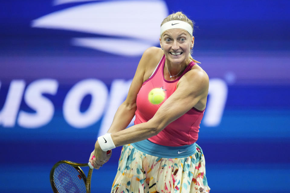 Petra Kvitova, of the Czech Republic, returns a shot to Caroline Wozniacki, of Denmark, during the second round of the U.S. Open tennis championships, Wednesday, Aug. 30, 2023, in New York. (AP Photo/Frank Franklin II)