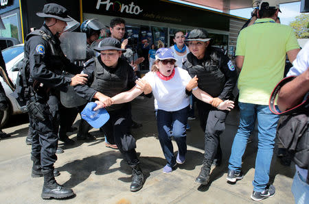 Riot police detain a demonstrator during a protest against the government of Nicaragua's President Daniel Ortega in Managua, Nicaragua March 16, 2019. REUTERS/Oswaldo Rivas