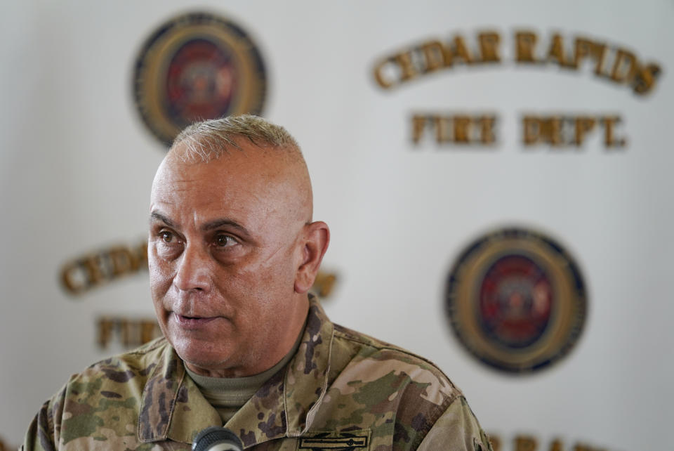 Iowa National Guard commander Adjutant General Benjamin Corell speaks during a news conference, Friday, Aug. 14, 2020, in Cedar Rapids, Iowa. Gov. Kim Reynolds pushed back Friday against criticism that she has been slow to respond to a wind storm that devastated the state and promised more help soon for tens of thousands of residents entering their fifth day without electricity. (AP Photo/Charlie Neibergall)