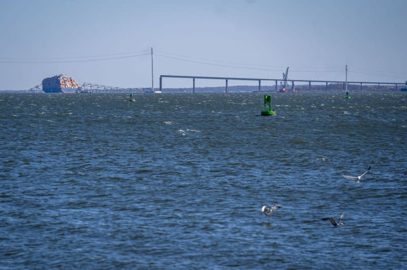 The Dali cargo vessel is seen from shore Friday following the collapse of the Francis Scott Key Bridge in Baltimore, Md. Photo by Bonnie Cash/UPI