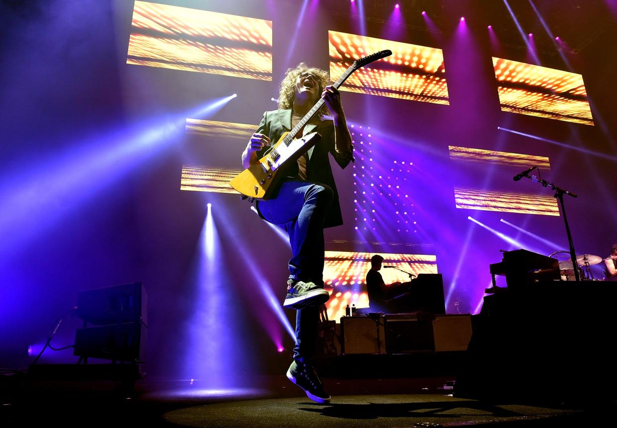 Musician Dave Keuning of The Killers performs onstage during the grand opening of T-Mobile Arena on April 6, 2016 in Las Vegas, Nevada.