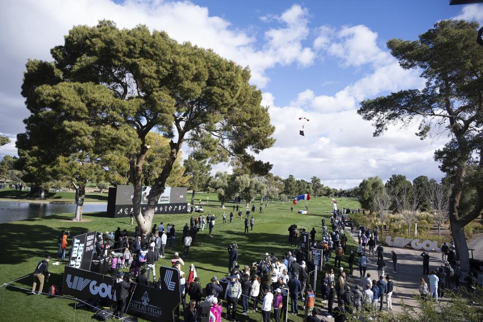 Frog-X Parachute Team members are seen on the first hole during the first round of LIV Golf Las Vegas at Las Vegas Country Club on Thursday, Feb. 8, 2024, in Las Vegas. (Charles Laberge/LIV Golf via AP)