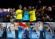 Supporters of Emmanuel Macron, head of the political movement En Marche !, or Forward !, and candidate for the 2017 French presidential election, cheer before a political rally in Toulon, France February 18, 2017. REUTERS/Jean-Paul Pelissier
