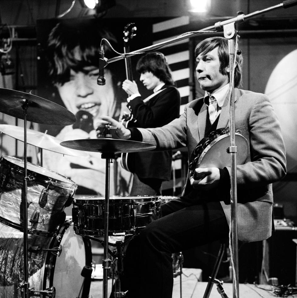 <p>Charlie Watts of The Rolling Stones, during rehearsals for an episode of the Friday night TV pop/rock show 'Ready Steady Go!', at Associated-Rediffusion's Television House studios in London, 26th February 1965.</p>