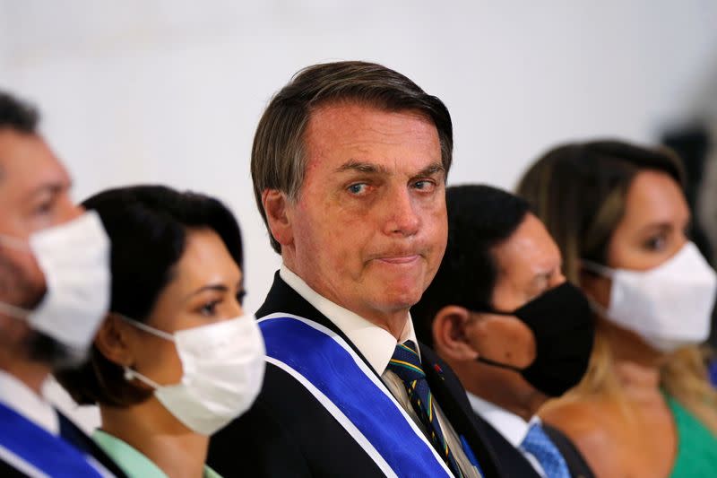 FILE PHOTO: Brazil's President Jair Bolsonaro looks on during a graduation ceremony for The Order of Rio Branco at the Itamaraty Palace, in Brasilia