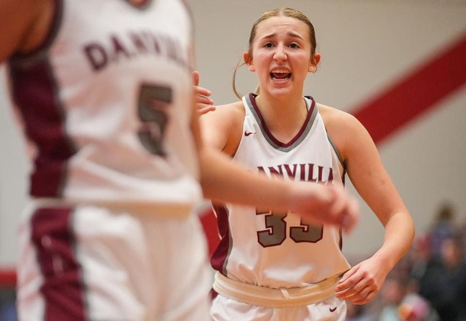 Danville's guard Emma Ancelet (33) yells to a teammate Saturday, Jan. 6, 2024, during the game at Danville Community High School in Danville.