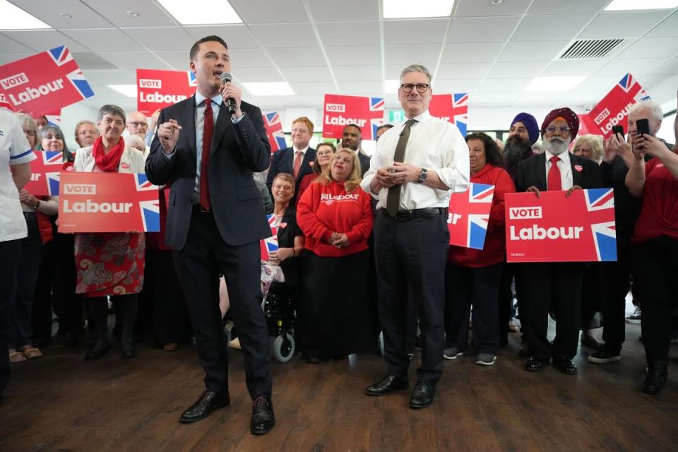 Labour leader Keir Starmer looks on as Shadow Health Secretary Wes Streeting speaks to supporters during a campaign event at Worcester City Football Club (Getty Images)