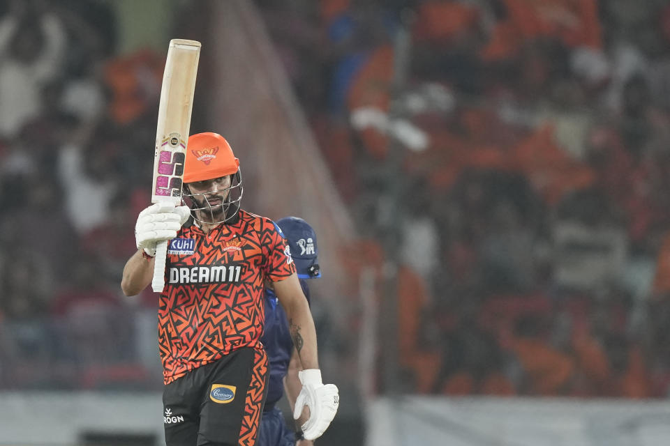 Sunrisers Hyderabad's Nitish Kumar Reddy celebrates his fifty runs during the Indian Premier League cricket match between Sunrisers Hyderabad and Rajasthan Royals in Hyderabad, India, Thursday, May 2, 2024. (AP Photo/Mahesh Kumar A.)
