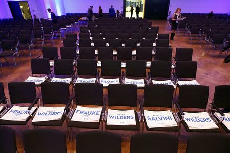 Chairs are prepared with placards with the names of Germany's Alternative for Germany (AfD) leader Frauke Petry, Matteo Salvini of the Northern League and Netherlands' Party for Freedom (PVV) leader Geert Wilders before the start of a European far-right leaders meeting to discuss about the European Union, in Koblenz, Germany, January 21, 2017. REUTERS/Wolfgang Rattay