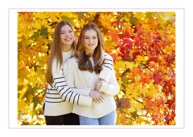 <p><strong>King Felipe</strong> and <strong>Queen Letizia </strong>of Spain used a photo of their daughters, Princess Leonor and Infanta Sofia, for their annual card. The sisters posed posed against a backdrop of colorful fall foliage for the picture. <em><a href="https://www.hola.com/realeza/casa_espanola/20221212222612/reyes-felipe-letizia-felicitacion-navidad-2022/" rel="nofollow noopener" target="_blank" data-ylk="slk:¡HOLA! Spain;elm:context_link;itc:0;sec:content-canvas" class="link ">¡HOLA! Spain</a></em> reported that the photo was taken in the gardens of Zarzuela Palace. </p><p>Casa de S.M. el Rey / Spanish Royal Household via Getty Images</p>