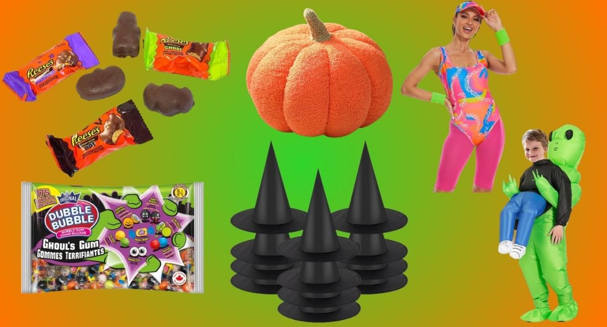 Halloween candy and gum, a plush pumpkin, witch hats, someone wearing a 80s workout costume, and a kid wearing an inflatable alien costume