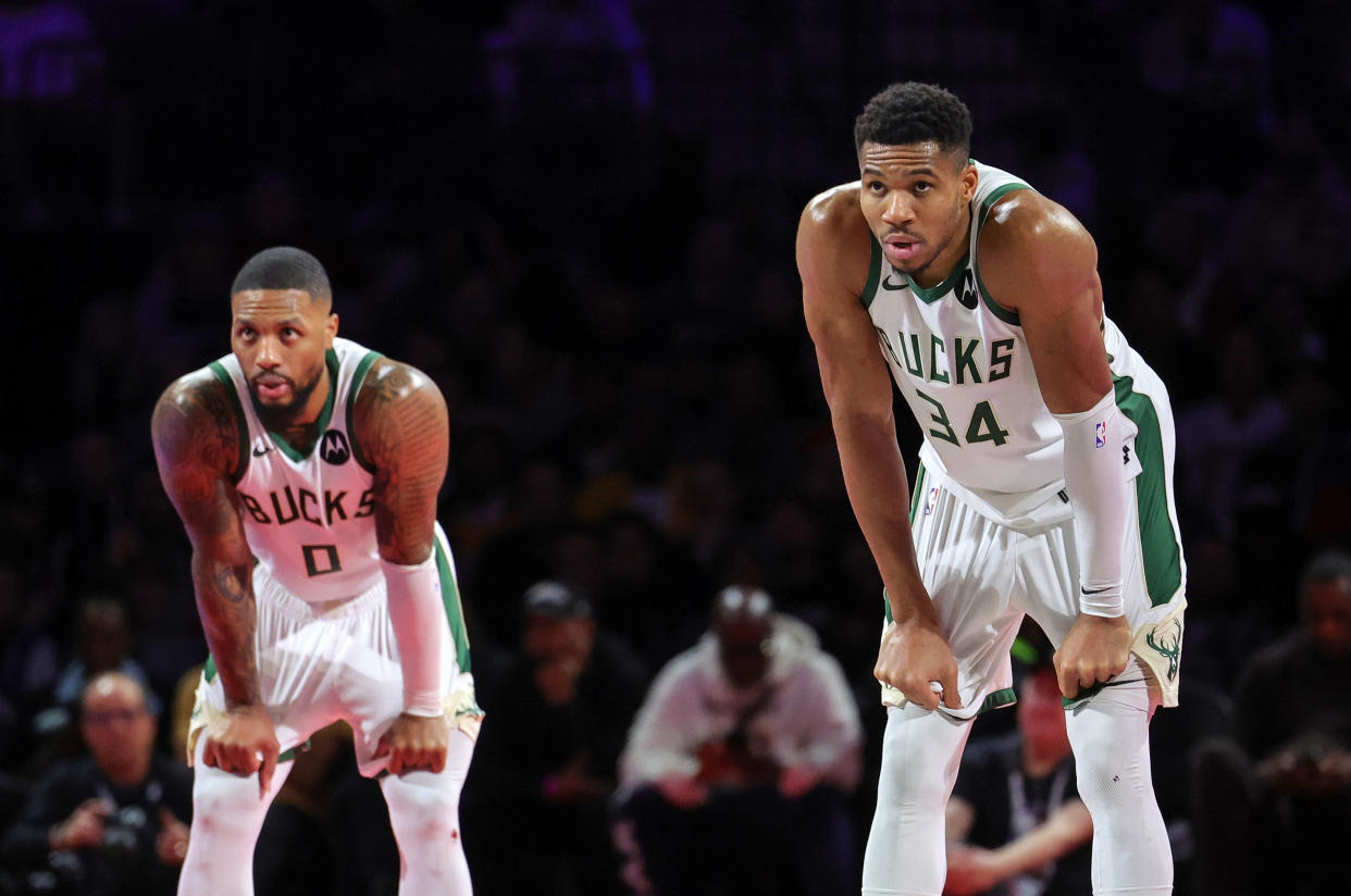 Damian Lillard and Giannis Antetokounmpo will both miss Game 4 against the Pacers. (Ethan Miller/Getty Images)