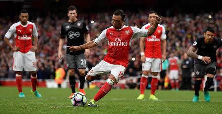 Britain Soccer Football - Arsenal v Southampton - Premier League - Emirates Stadium - 10/9/16 Arsenal's Santi Cazorla scores their second goal from the penalty spot Reuters / Dylan Martinez/ Livepic