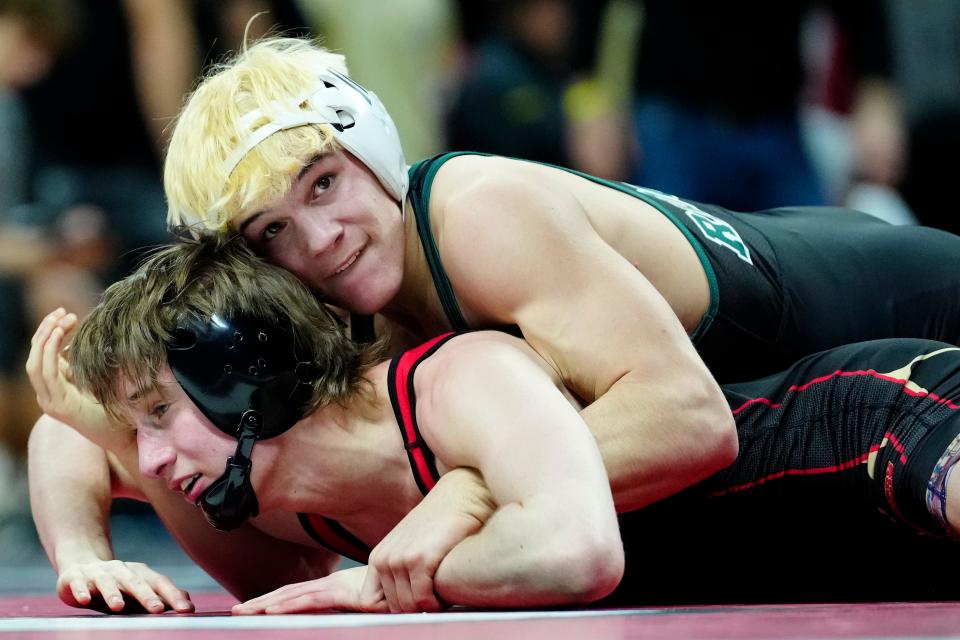 Gavin Duran, of Ridge, is in control of his 132 pound match against Matteo Eagleson, of Mount Olive. Duran went on to win the match, in Piscataway, Sunday, February 11, 2024.