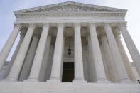 FILE - The U.S. Supreme Court is shown on Jan. 19, 2022, in Washington. Democrats ironclad unity on President Joe Biden’s nominations to the courts has helped Biden appoint the most judges during the first year of a presidency since John F. Kennedy. The achievement is giving Democrats hope that the coming fight over the Supreme Court seat will allow them to go on the political offensive and move past an ugly stretch of legislating that depressed their base. (AP Photo/Mariam Zuhaib, File)
