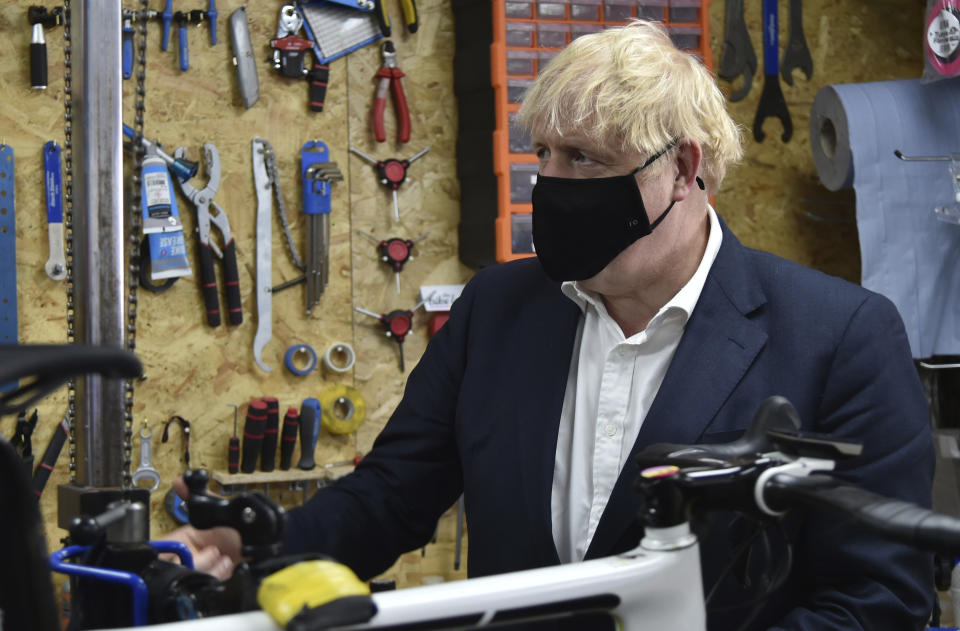 Prime Minister Boris Johnson during a visit to the Cycle Lounge, a bicycle repair shop in Beeston, Nottinghamshire, to launch a strategy to get more people cycling.