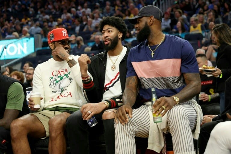 Having NBA stars such as LeBron James, right, Anthony Davis, center, and Carmelo Anthony missing the same game while resting soon could run afoul of tighter league rules (EZRA SHAW)