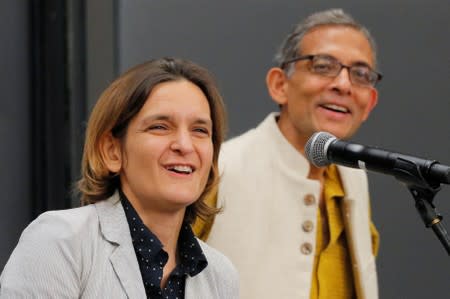 Banerjee and Duflo, two of the three winners of the 2019 Nobel Prize in Economics, speak at news conference at MIT in Cambridge