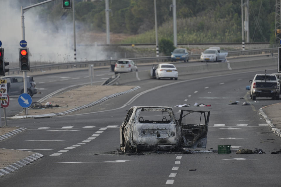 FILE - A car destroyed in an attack by Palestinian militants is seen in Sderot, Israel, on Saturday, Oct. 7, 2023. (AP Photo/Ohad Zwigenberg, File)