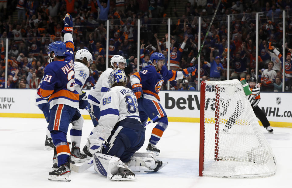 New York Islanders center Mathew Barzal (13) scores a goal against Tampa Bay Lightning goaltender Andrei Vasilevskiy (88) during the second period in Game 4 of an NHL hockey Stanley Cup semifinal, Saturday, June 19, 2021, in Uniondale, N.Y. (AP Photo/Jim McIsaac)