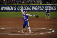 UCLA's Rachel Garcia pitches in the first inning of an NCAA Women's College World Series softball game against Alabama, Friday, June 4, 2021, in Oklahoma City. (AP Photo/Sue Ogrocki)