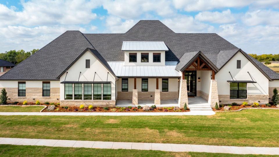 Sun Custom Homes had this home at 3401 Brush Arbor Drive in Moore in last month's Parade of Homes , Sun Custom Homes Fall Classic. The 3,708-square-foot home has three bedrooms and three bathrooms.