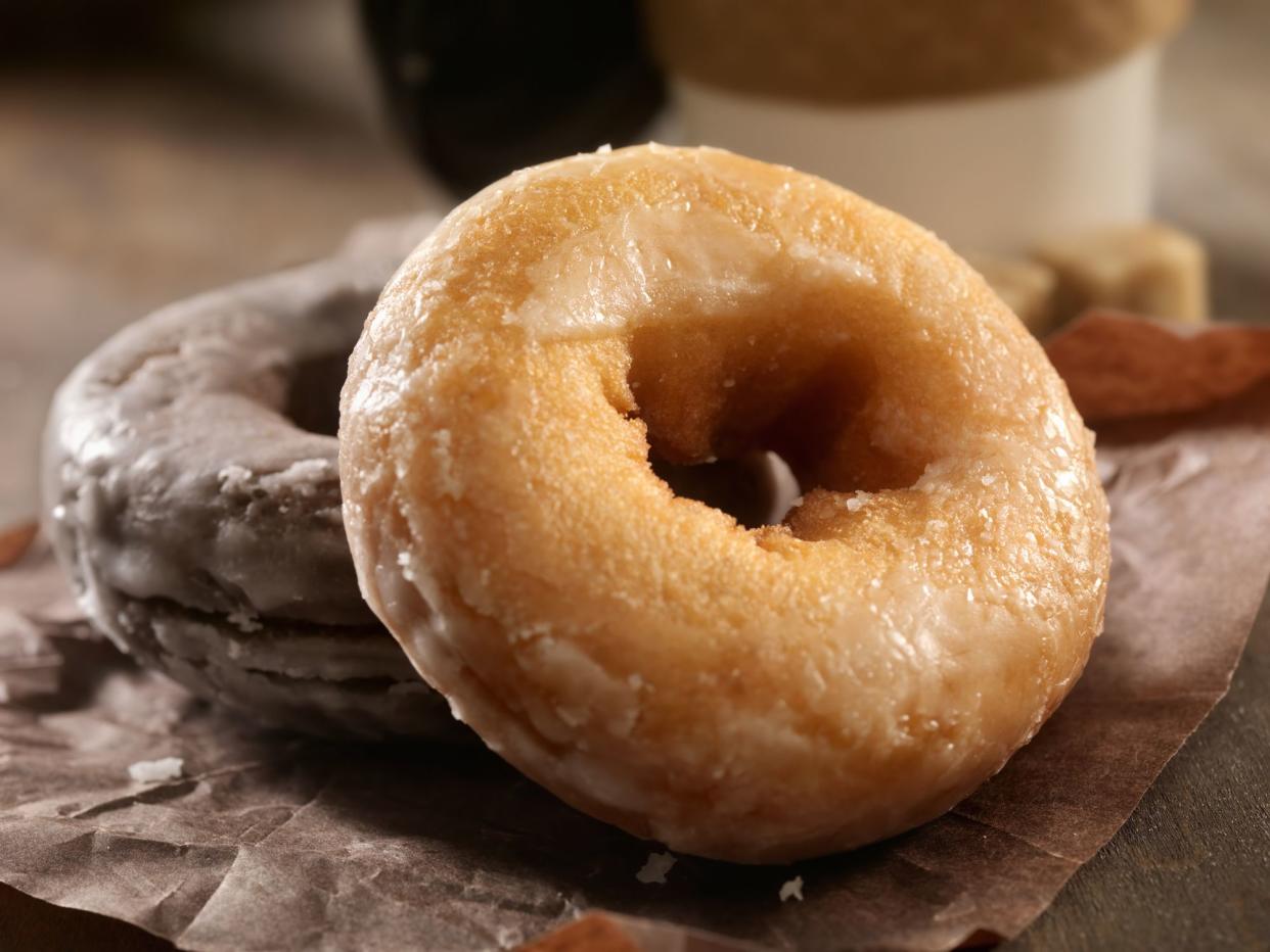 Glazed Doughnuts with a take out Coffee- Photographed on Hasselblad H3D2-39mb Camera