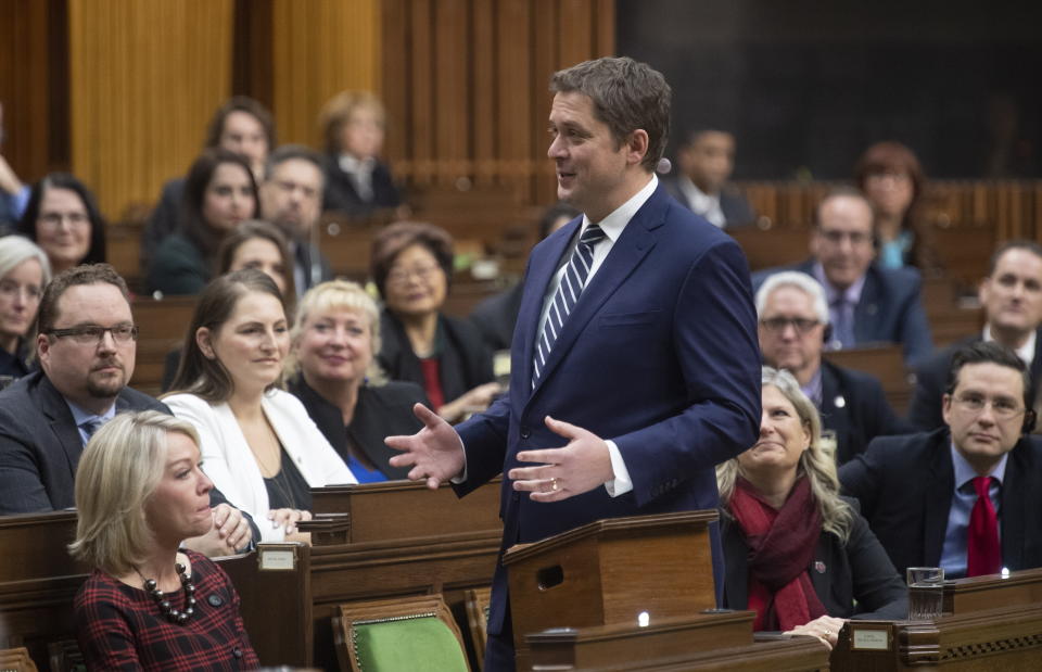 Leader of the Opposition Andrew Scheer turns and speaks to Conservative MP's as he announces he will step down as leader of the Conservatives, Thursday, December 12, 2019 in the House of Commons in Ottawa. (Adrian Wyld/The Canadian Press via AP)