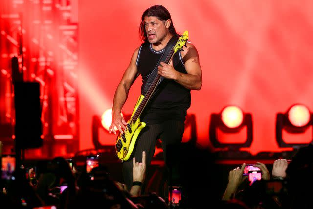 <p>Kevin Mazur/Getty Images for Power Trip</p> Robert Trujillo of Metallica performs in Indio, California on Oct. 8, 2023